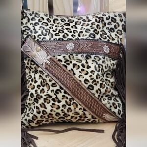 Myra animal print sling bag.